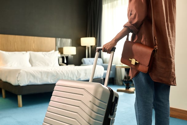 back-view-of-woman-entering-hotel-room-2024-07-03-00-44-20-utc