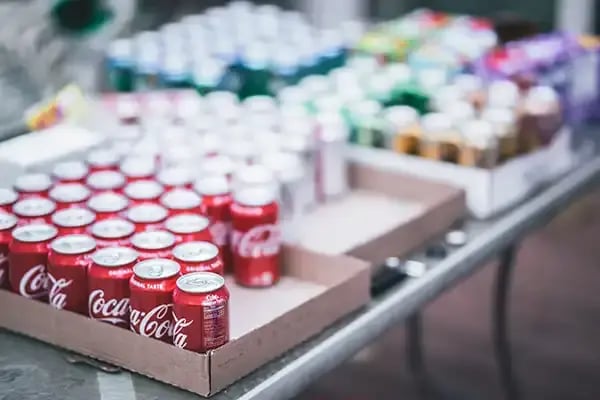 caja latas coca cola